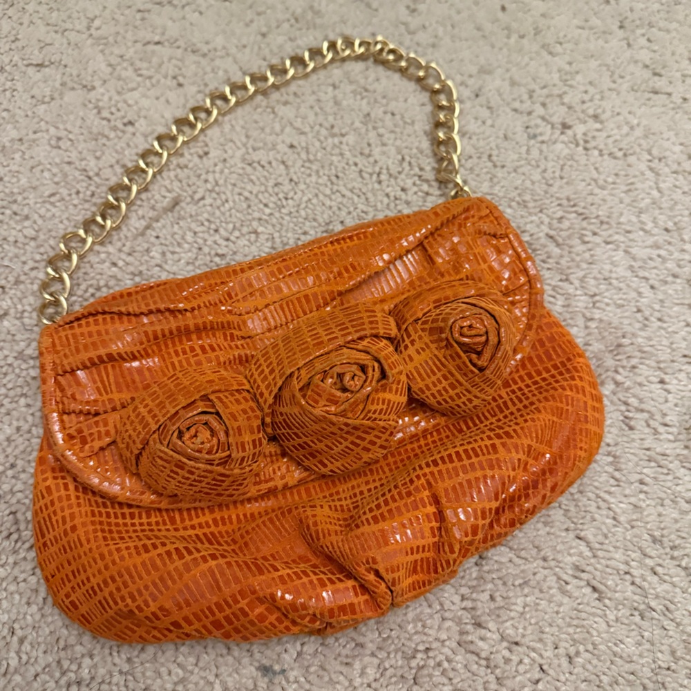 Inge Christopher Orange Clutch with Gold Chain